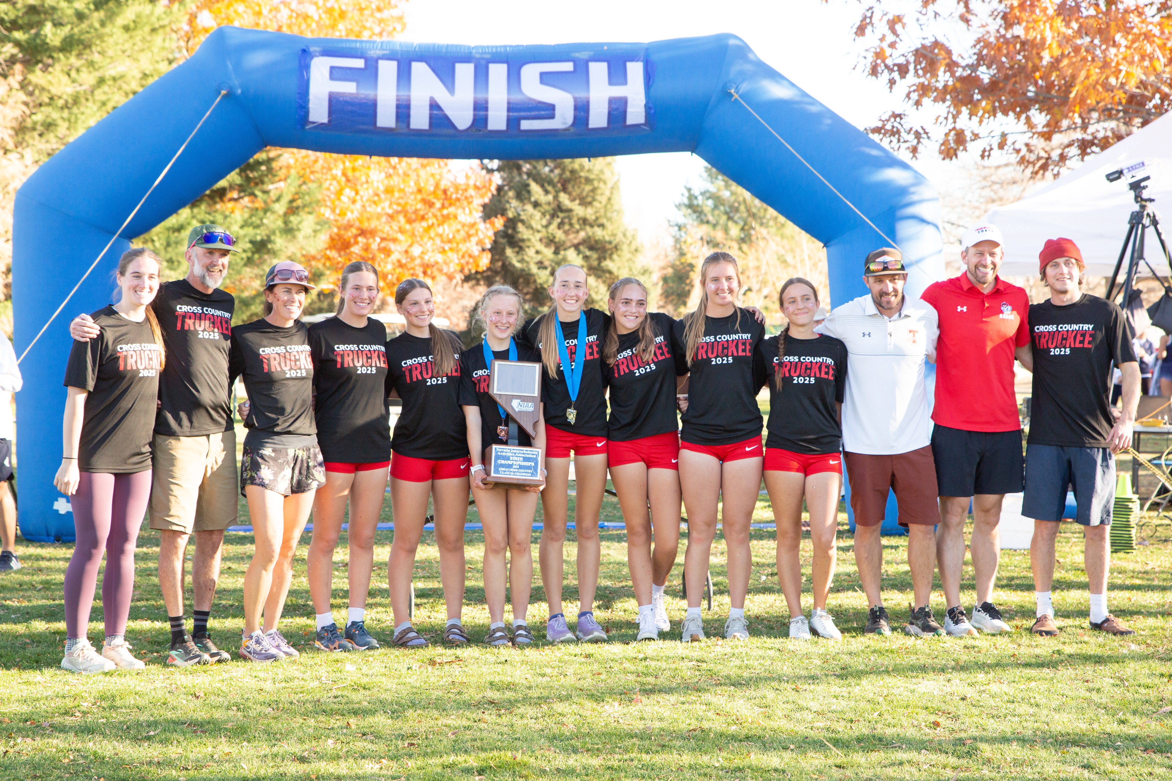 TruckeeXC Girls Team celebrating a Nevada 3A State Championship